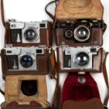 Four Zeiss Ikon Contax cameras with lens and lether cases. (4)Photos of every model uploaded.