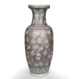 A late 19th / early 20th century Chinese porcelain vase with enamelled foliate decoration, 23cm wide