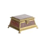 A 19th century French porphyry and gilt metal jewellery casket of rectangular tapering form with a