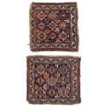 A pair of late 19th century dark and blue ground Khorjin with geometric decoration, 60cm