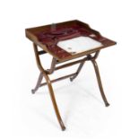 A late 19th century walnut campaign folding desk with a maroon leather interior, 62cm wide x 97cm