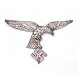 A German Third Reich chrome eagle pole top, 23cm wide x 15cm highDents and marks to the wing tips,