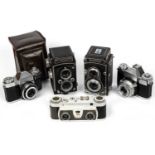 Two Zeiss contaflex cameras a Wray stereo graphic camera a flexaret and a microcord.(5)All untested