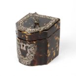 An Edwardian tortoiseshell veneered tea caddy of slope top cutlery box form, applied silver