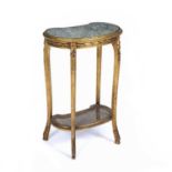 An early 20th century French kidney shaped side table with a marble inset top and a caned undertier.