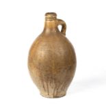 A late 17th early 18th century stoneware bottle with a loop handle. 21cm wide 35.5cm highChip to