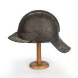 A Cromwellian style lobster tail helmet 20cm wide x 38.5cm deep x 28cm high, found in the mid 20th