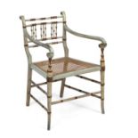 A Regency painted faux bamboo open armchair with a caned seat and turned supports, 54cm wide x