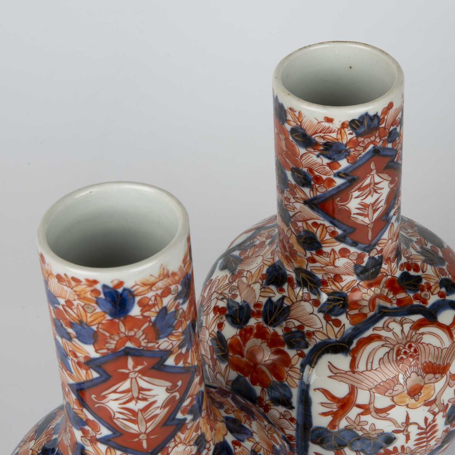 A pair of late 19th century Japanese Imari bottle vases with covers, 15cm wide 27cm high.Good, minor - Image 4 of 4