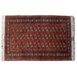 A late 20th century Turkmen red ground rug 124cm x 166cmIn good condition