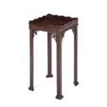 A 19th century Chippendale style mahogany occasional table with a galleried top, blind fret carved