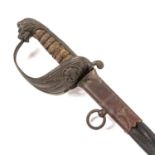 A 1827 pattern Royal Naval Reserves Officer's sword with a lion's head pommel and a wire bound