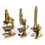 A 19th century brass monocular compound microscope by J & C Robbins, Bartholomew Close, London, with