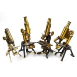 A 19th century monocular compound microscope by J Swift & Son London, numbered 450, with two