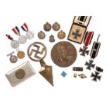 A group of military medals and badges to include a British War medal awarded to Private F H Lake R.