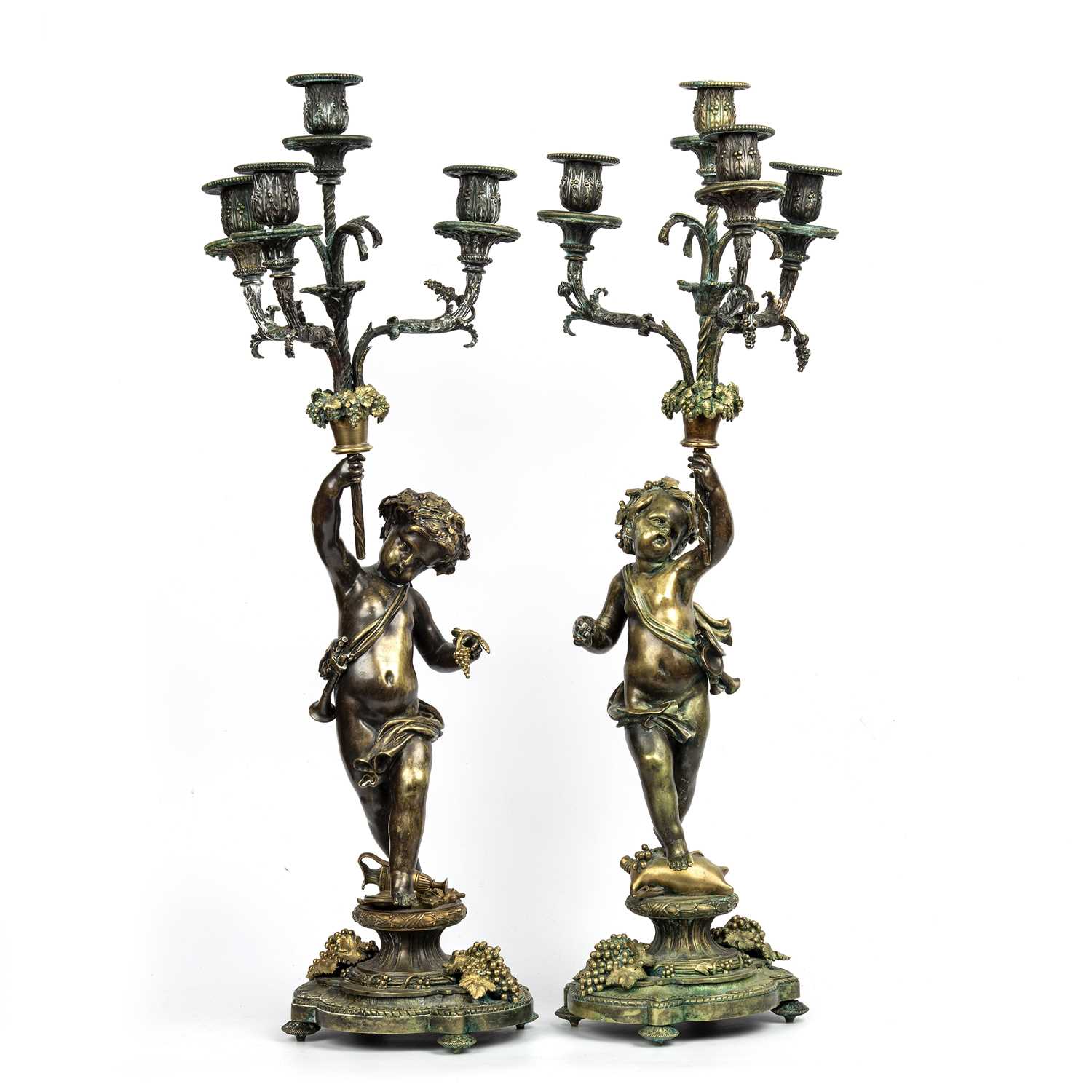 An Impressive near pair of 19th century Louis XVI style French bronze four branch candelabras of