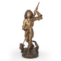 An antique German carved Lindenwood and polychrome figure of St George slaying the dragon. 22cm wide