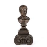 Archille Collas (1794-1859) bronze bust of Caesar on a cast iron base overall 8cm wide 17cm high.