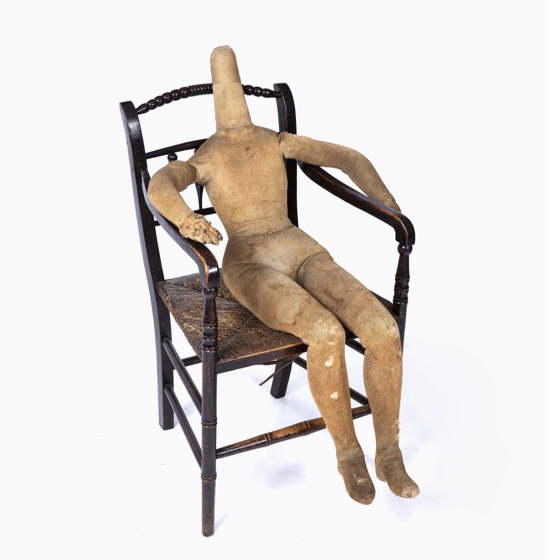 A mid 19th century child size artists lay figure with articulated brass joints and a wooden frame