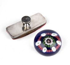 A silver blotter, 10cm wide; together with a 20th century French style glass millefiori paperweight,