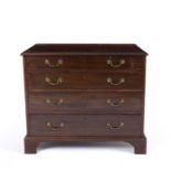 A 19th century mahogany chest of four long graduated drawers with brass swan neck handles and