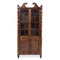 A 19th century mahogany bookcase cabinet with astragal glazed doors above twin panelled doors,