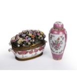 A Sampson porcelain famille rose desk stand with a lifting top encrusted with porcelain and toleware