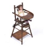 An Armand Marseille doll, model 370AM3/0DEP together with a doll's high chair doll 40cm in height,