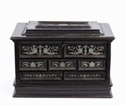 An 18th / 19th century continental ebonised table casket with pewter inlaid decoration, a lifting