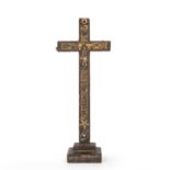 An antique lacquered crucifix 7.5cm wide 31cm high