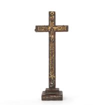 An antique lacquered crucifix 7.5cm wide 31cm high