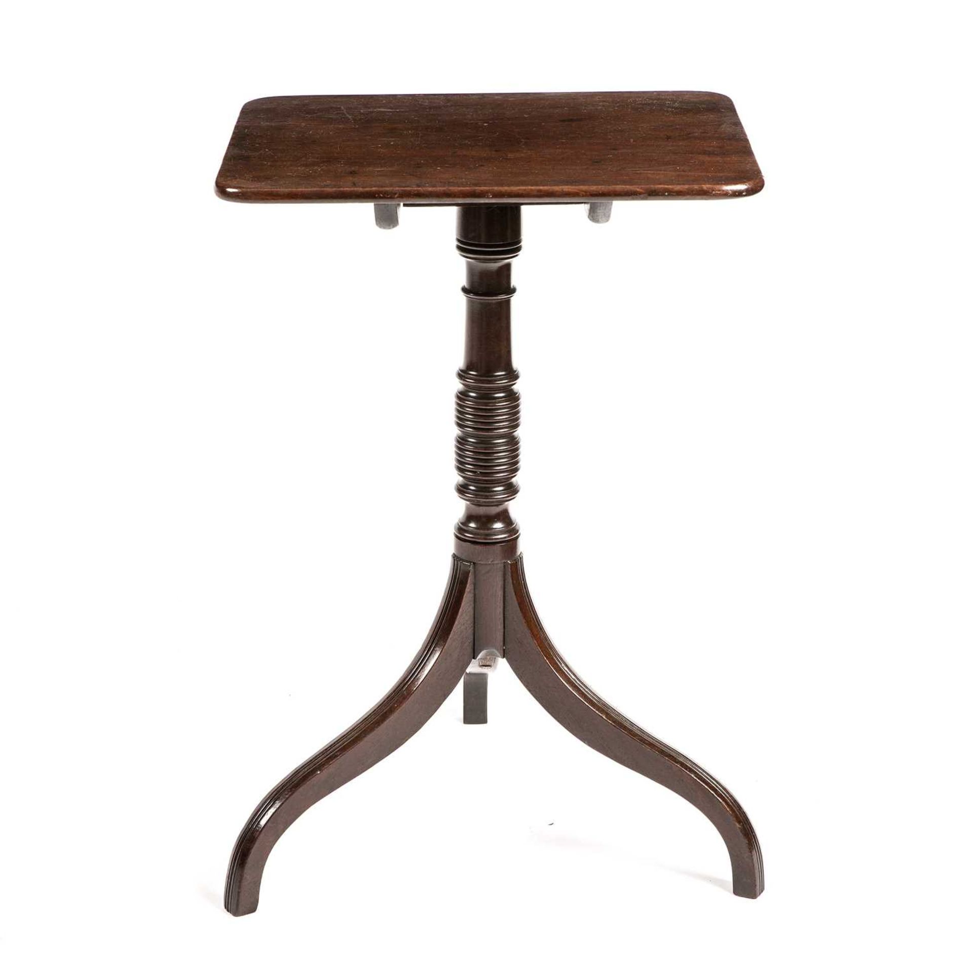 A Regency mahogany tilt top wine table with a turned stem and tripod base. 49cm wide 44cm deep - Image 3 of 3