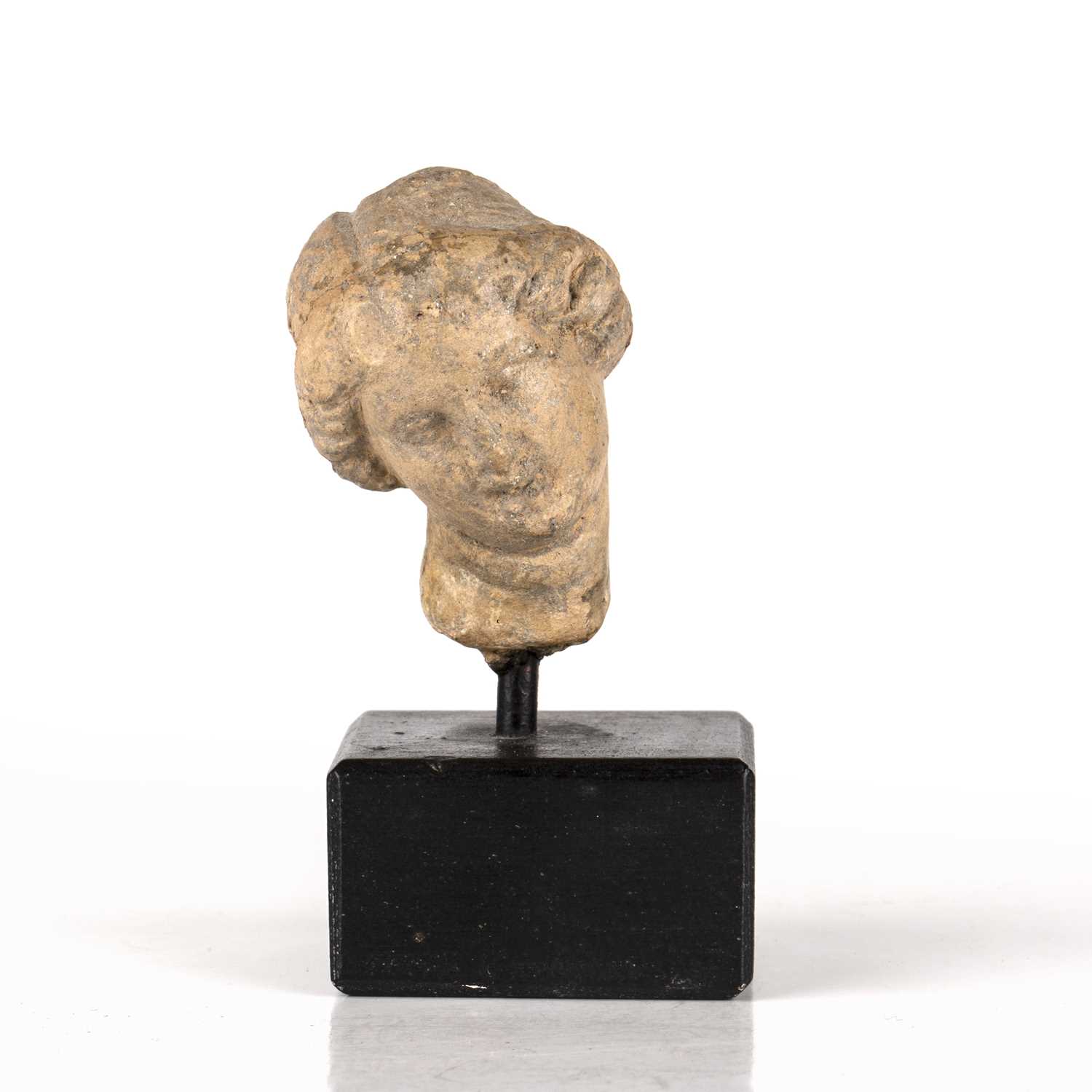 Antique possibly ancient Greek terracotta head of a female. 2.5cm x 4cm high. She's fine, natural