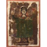 A coptic cloth fragment, a figure in green. 16cm x 11cm