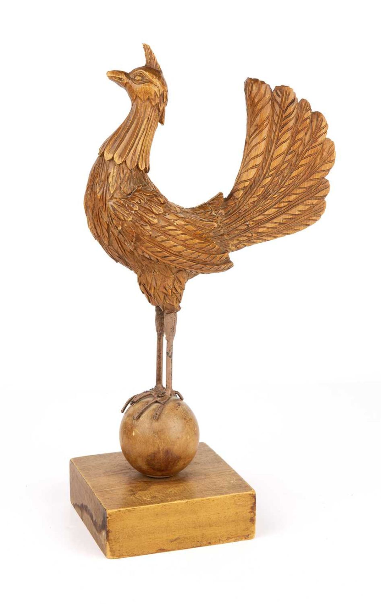A French carved pine model of a cockrel, 23cm wide x 45cm high Chips, cracks and restoration.