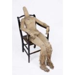 A mid 19th century adult size artists lay figure with articulated brass joints and a wooden frame