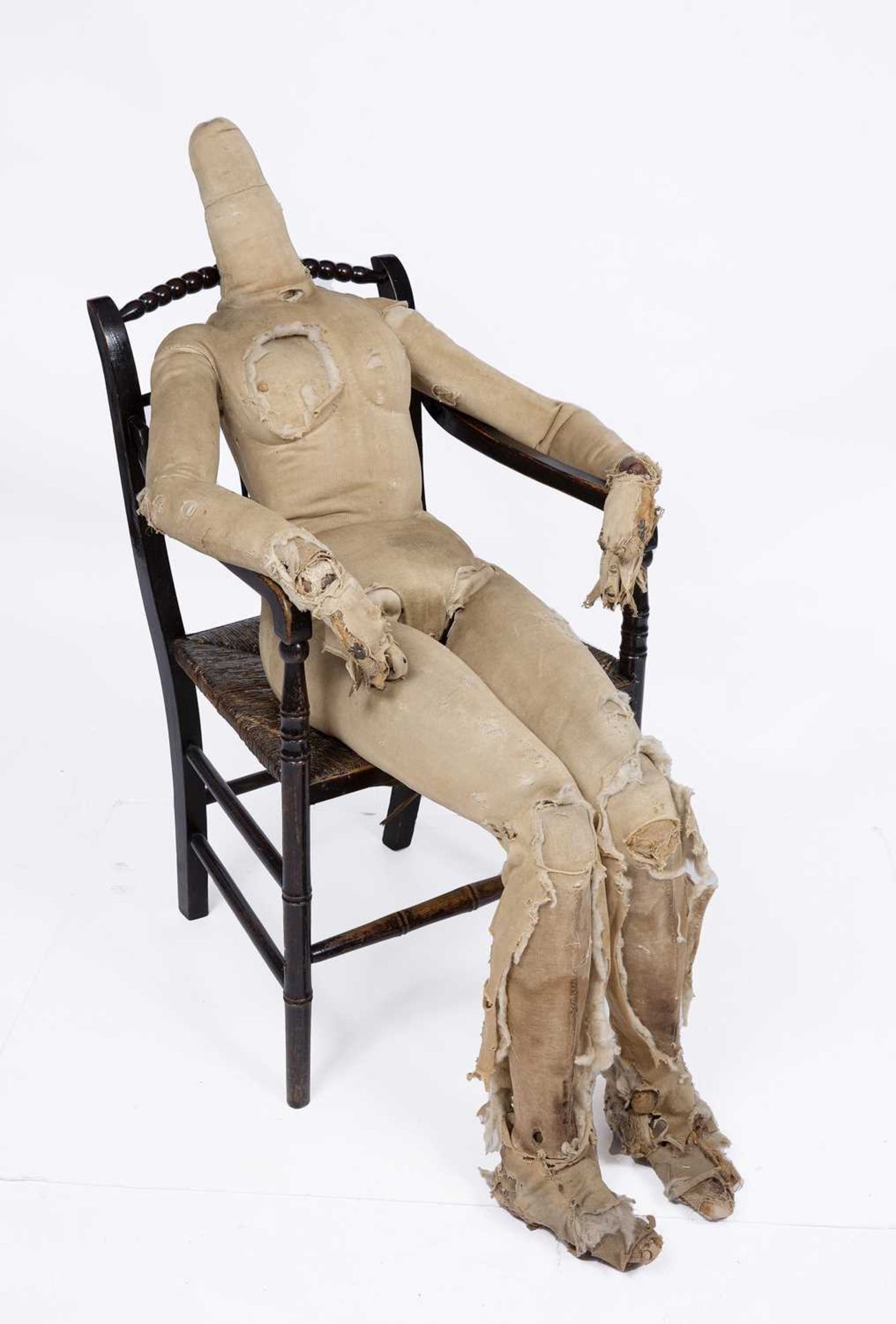 A mid 19th century adult size artists lay figure with articulated brass joints and a wooden frame