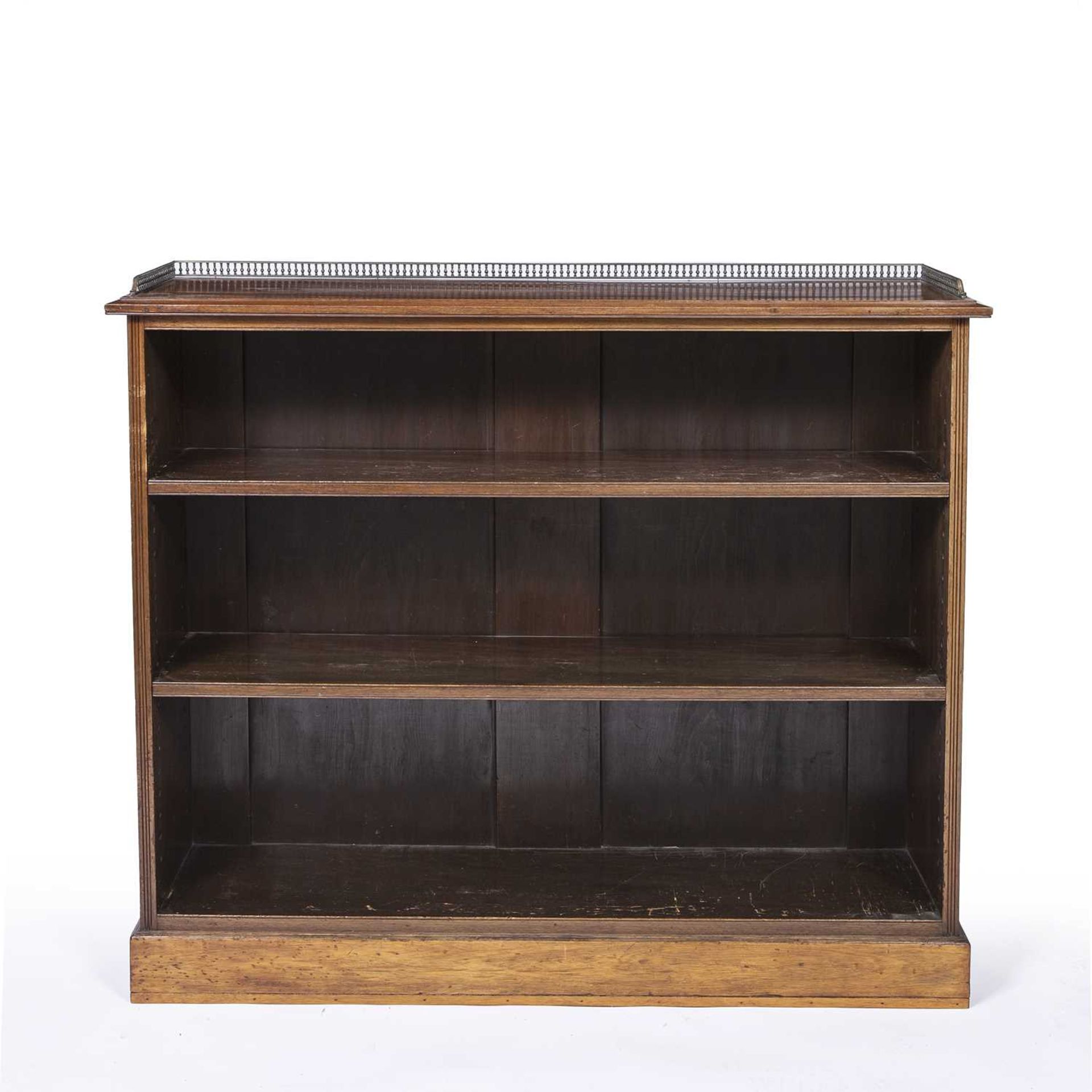 A 19th century mahogany open front bookcase with a brass gallery and two shelves. 124cm wide 33cm