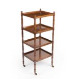 A Regency mahogany four-tier whatnot in the manner of Gillows having turned supports and brass