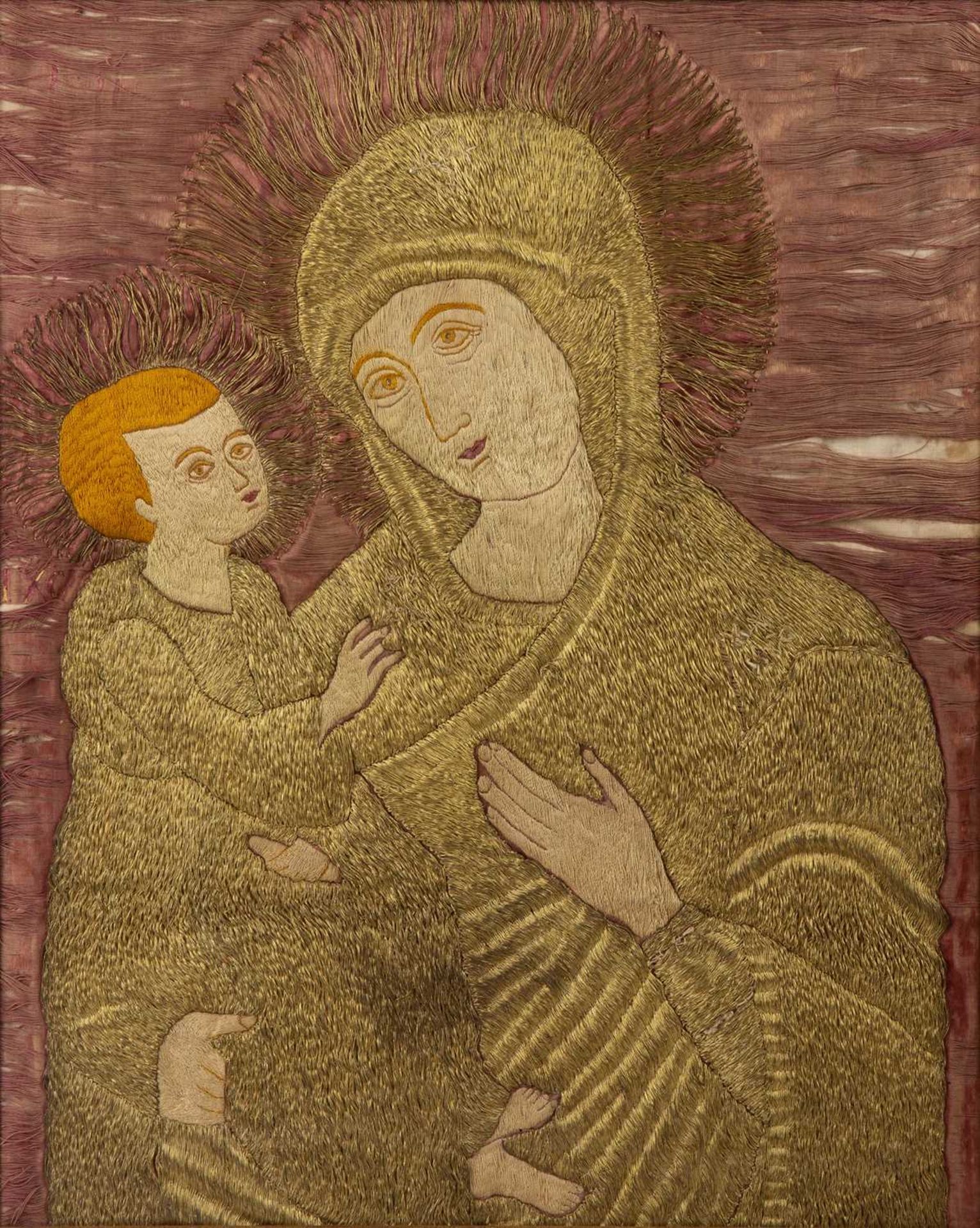 A 19th century or earlier European Madonna and child with bullion work on a manganese silk