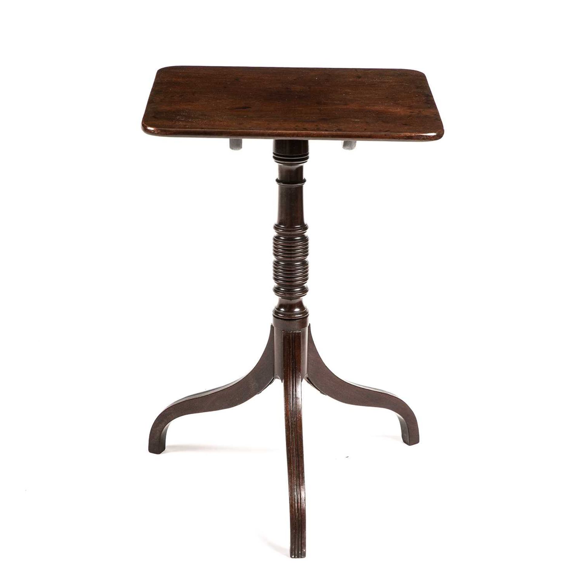 A Regency mahogany tilt top wine table with a turned stem and tripod base. 49cm wide 44cm deep - Image 2 of 3