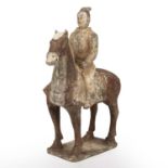 A Chinese Tang style pottery horse and rider 23cm wide 30cm high. Untested From a private