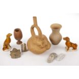 Objects to include an oxus terracotta wine cup, 13cm high, a pre Columbian style stirrup vase,
