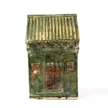 A Chinese Han style green glazed model of a funerary house 21cm high. Previously from the collection