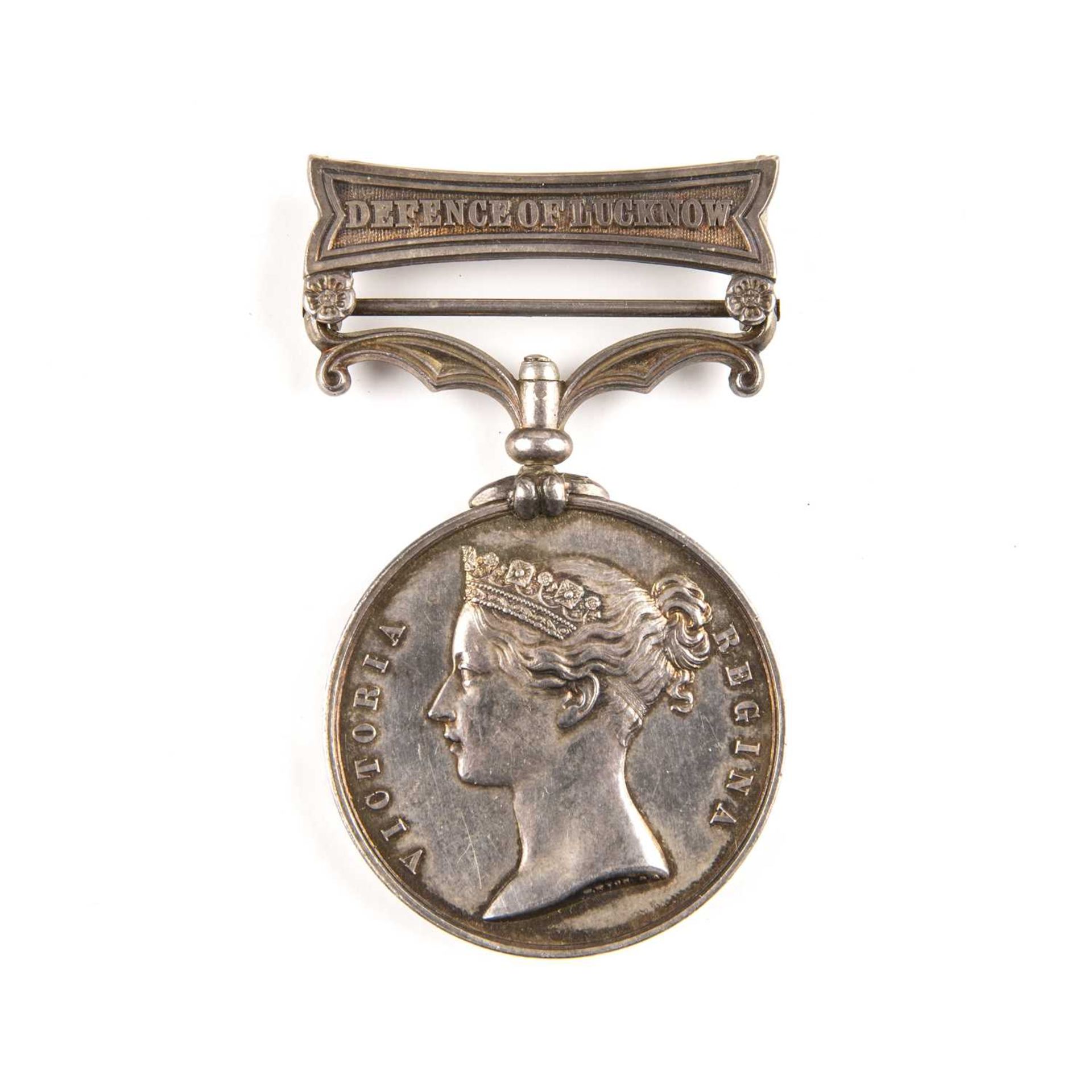 Indian mutiny, 1857-58 defence of Lucknow war medal. S. Fox 32nd L. I. on the rim. See new condition