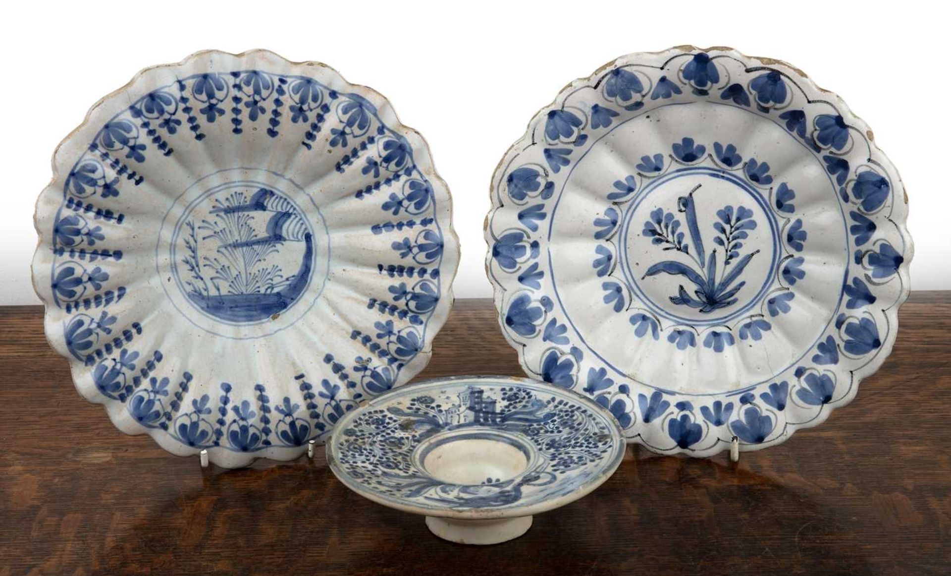 Two blue and white tin-glazed dishes Dutch/German, early 18th Century, and a smaller tin glaze