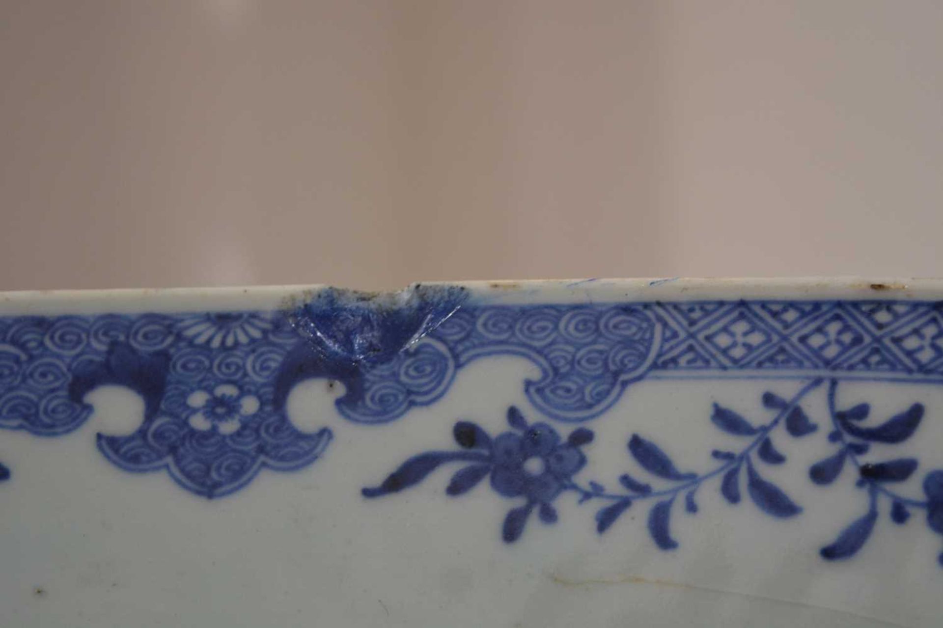 Three blue and white export dishes Chinese, circa 1800, the largest meat plate with tree and - Image 3 of 15