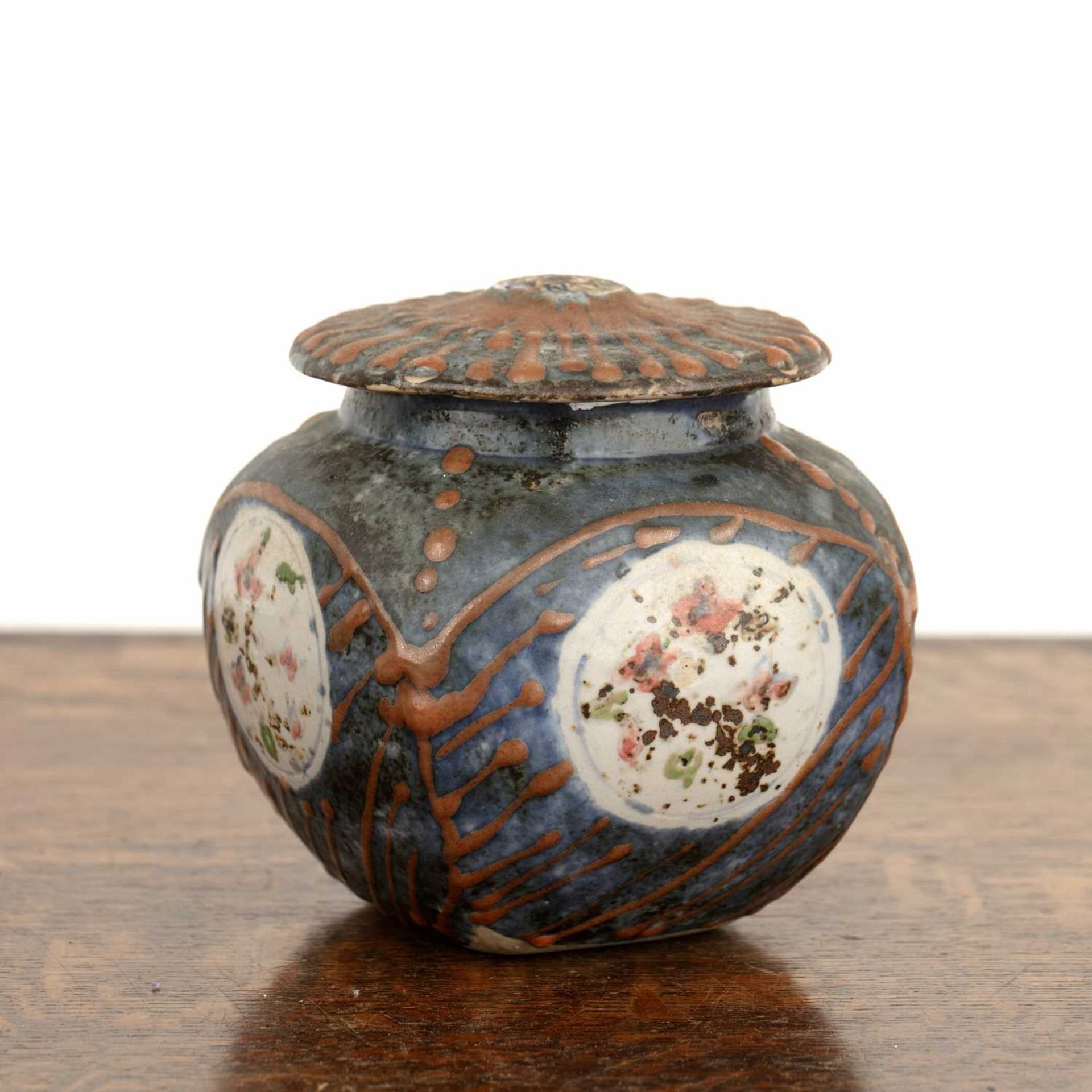 In the manner of Tatsuzo Shimaoka (1919-2007) studio pottery, vase and cover, with floral roundel