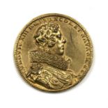 After Guillaume Dupre (1574-1647) gilt bronze medallion of Louis XIII, dated 1623, and marked G.