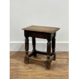Oak joint stool 18th Century, with carved decoration, 43cm x 27.5cm x 48cm Provenance: The